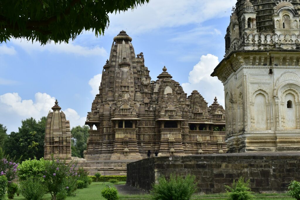 a group of stone structures in a park